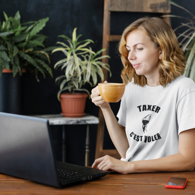 unisex-t-shirt-mockup-featuring-a-woman-working-on-her-computer-44359-r-el2